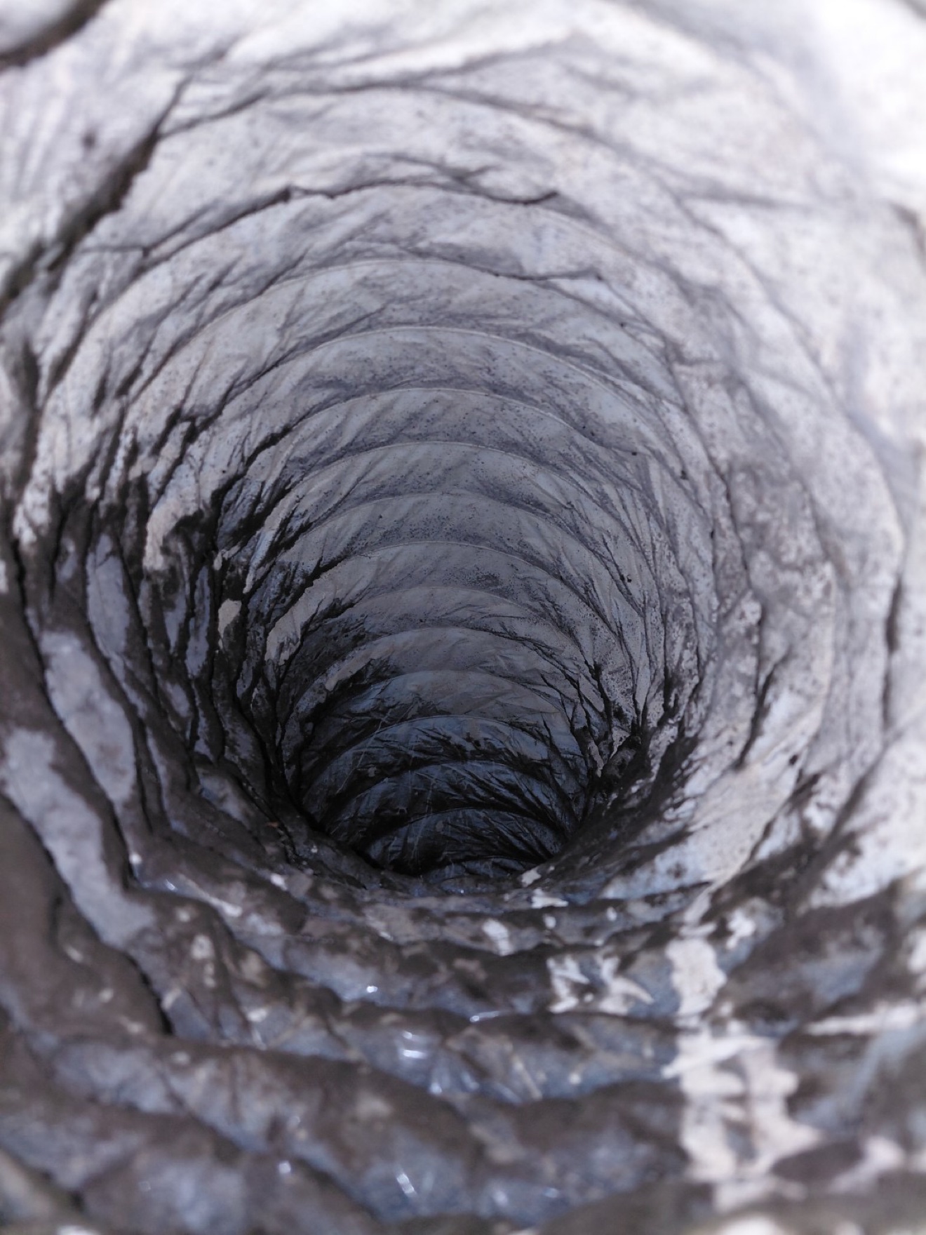 Dirty duct interior with heavy buildup before Fair Air Solutions cleaning