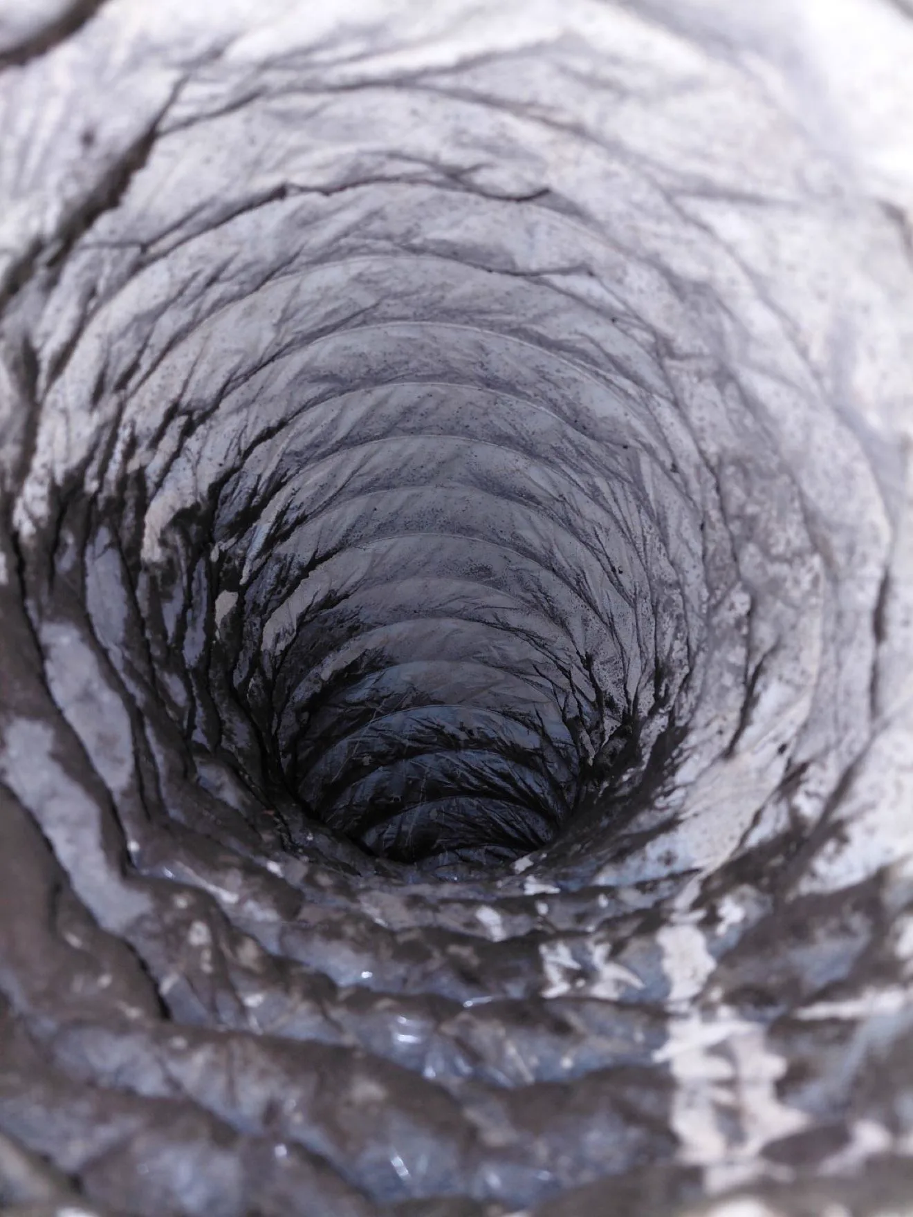 Dirty air duct interior before professional cleaning