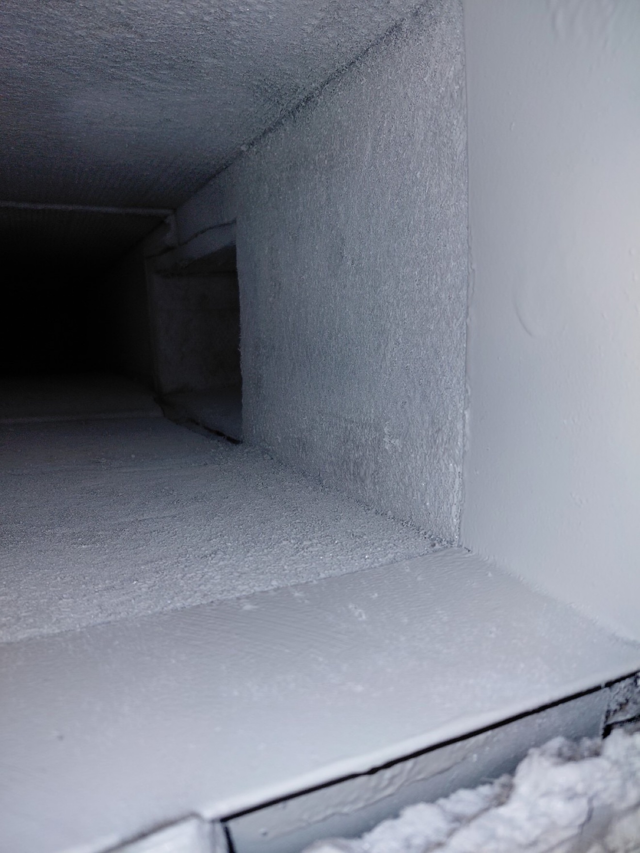 Freshly coated air duct interior after Fair Air Solutions professional coating