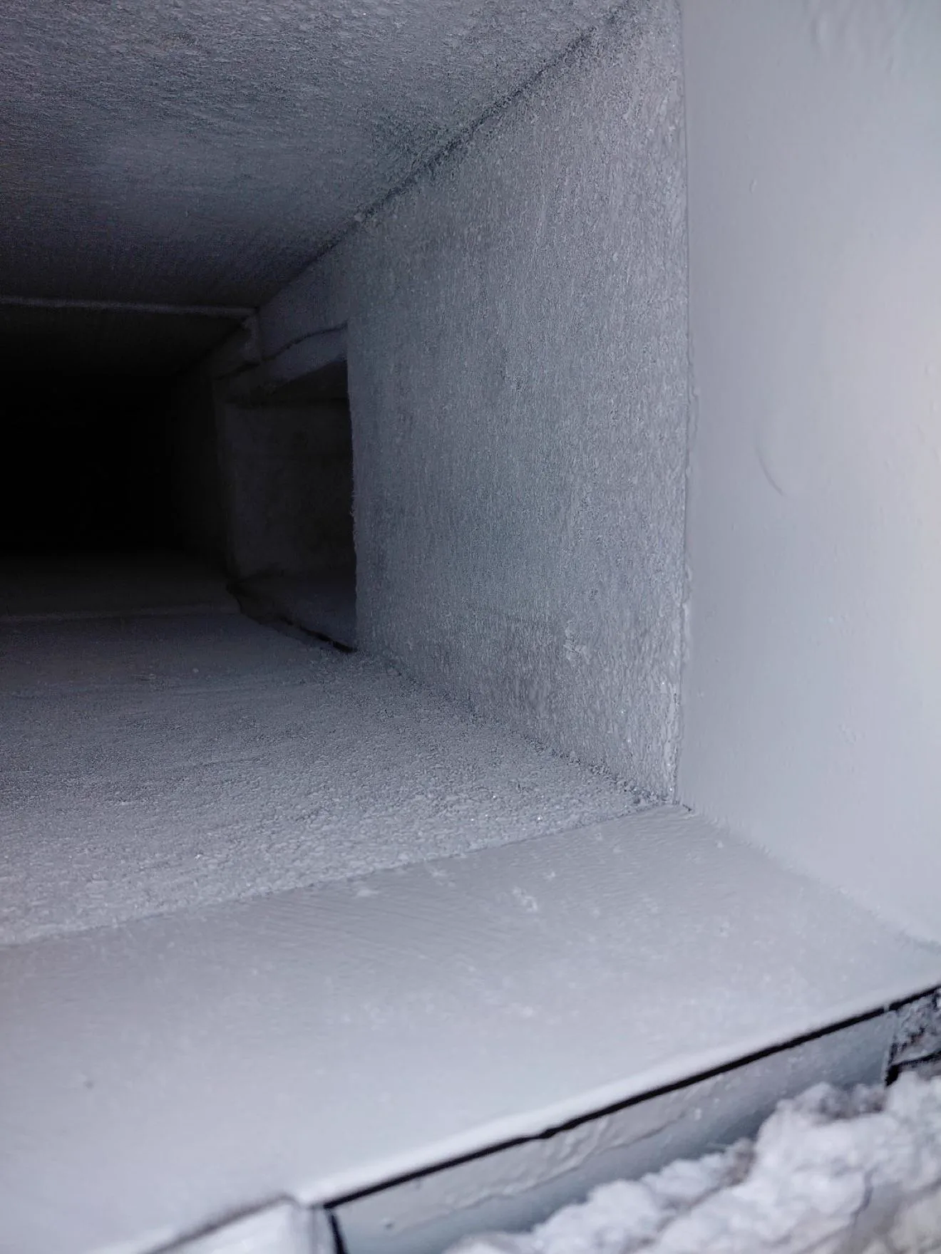Freshly coated air duct interior after Fair Air Solutions professional coating