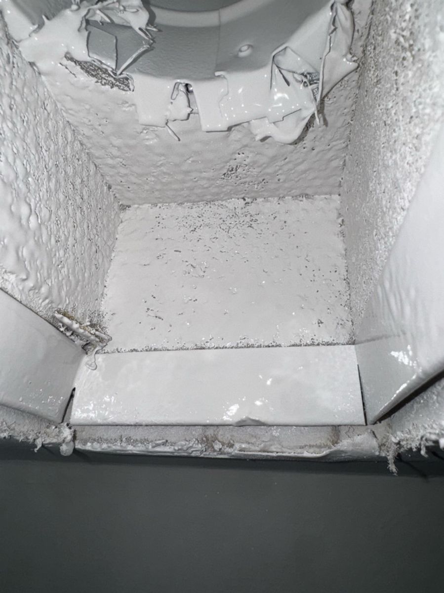 Same duct interior coated clean white after service