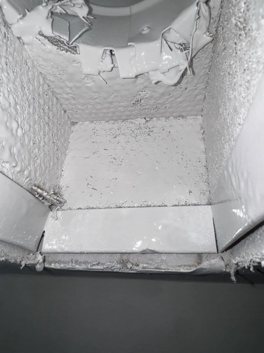 Same duct interior coated clean white after service